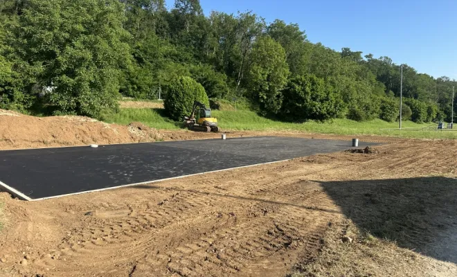 Pose, compactage et finition de la couche d'enrobé